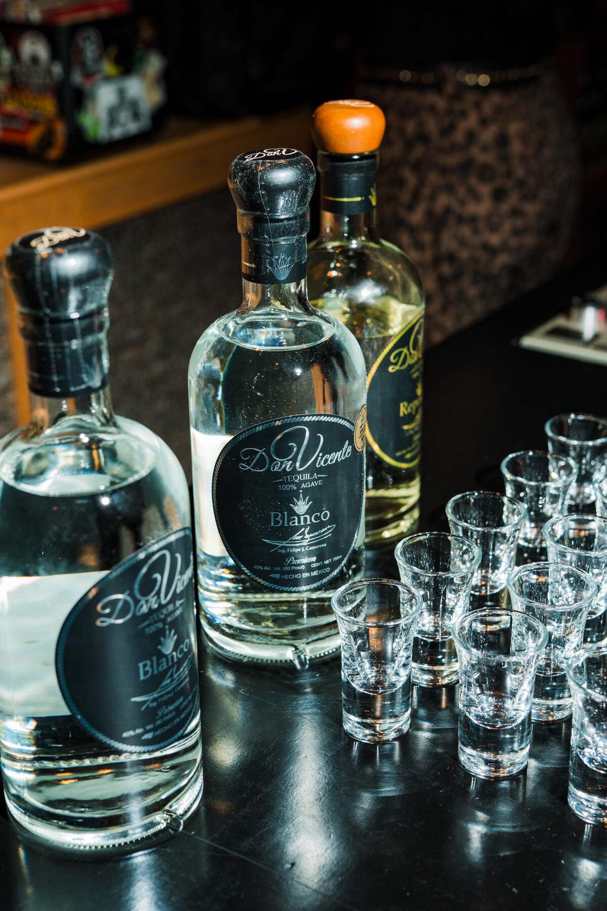 Additive free tequila and rows of tasting glasses set out along the bar before a masterclass